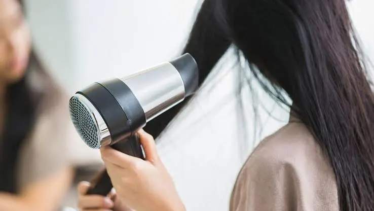penggunaan hair dryer